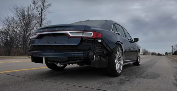 Video still of the V-10 swapped Lincoln Continental being driven for the first time. Build It Yourself on YouTube documented the build from start to finish.