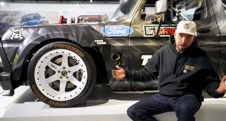 Video still of Zaras in front of the 1977 Ford F-150 Hoonitruck, one of the most famous vehicles built and driven by Ken Block.