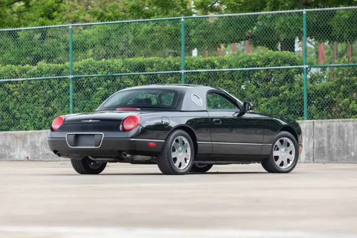 A photo showing the exterior of a 2002 Ford Thunderbird from a rear three quarters angle.