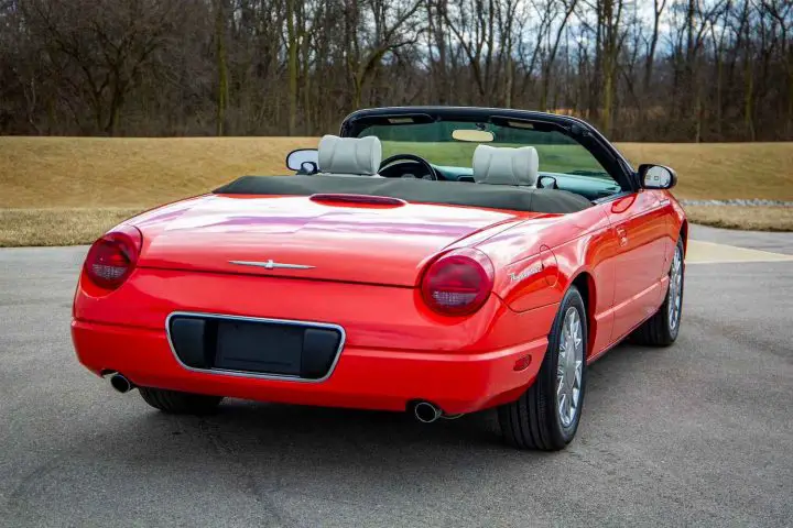 A photo showing the exterior of a 2003 Ford Thunderbird 007 James Bond Edition from a rear three quarters angle.