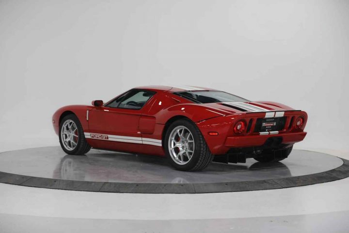 A photo showing the exterior of a 2005 Ford GT from a rear three quarters angle.