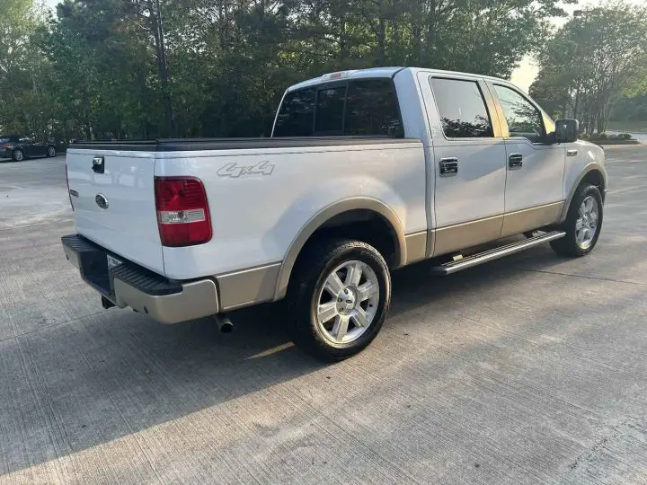 A photo showing the exterior of a 2008 Ford F-150 Lariat from a rear three quarters angle.