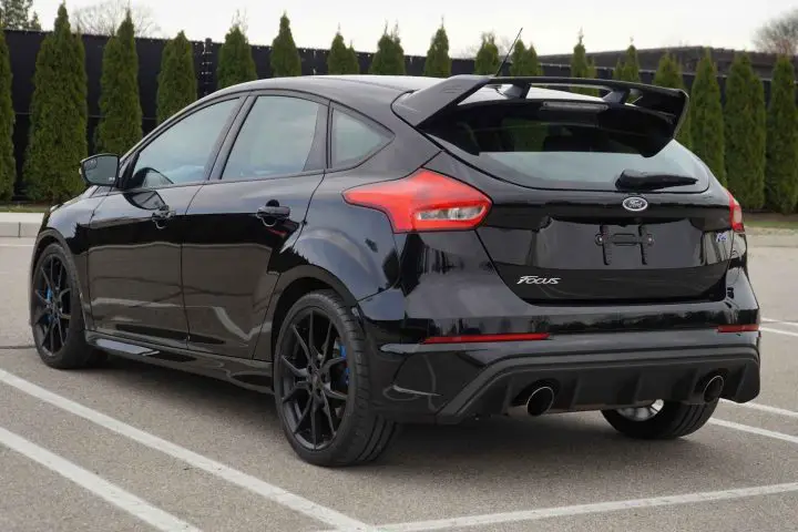 A photo showing the exterior of a 2016 Ford Focus RS from a rear three quarters angle.