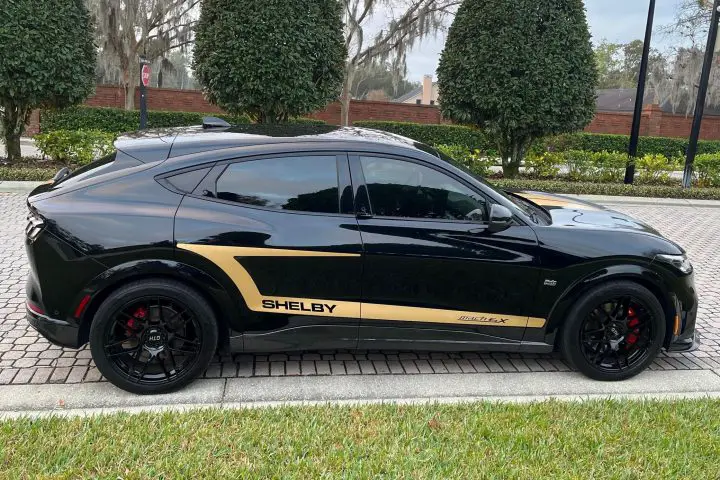 Photo showing a side view of the 2023 Ford Mustang Mach-E Shelby GT-H for sale, one of 100 examples of the model ever built. 