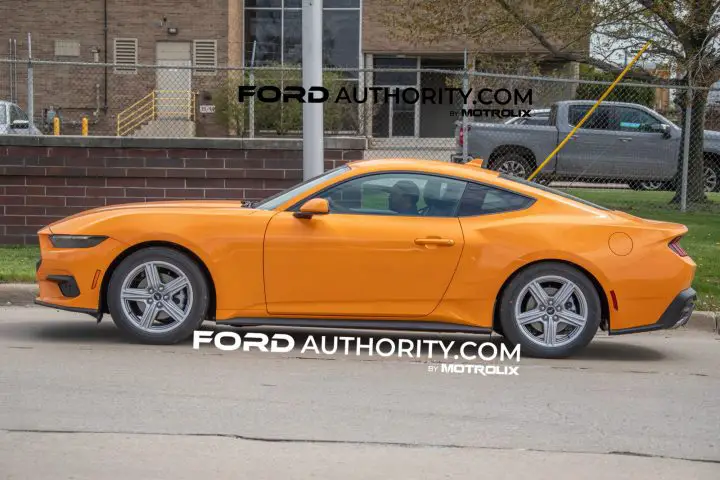 Photo showing a side view of the 2026 Ford Mustang EcoBoost in orange paint. This will be the first time a true orange hue has been offered on the seventh-gen Mustang.