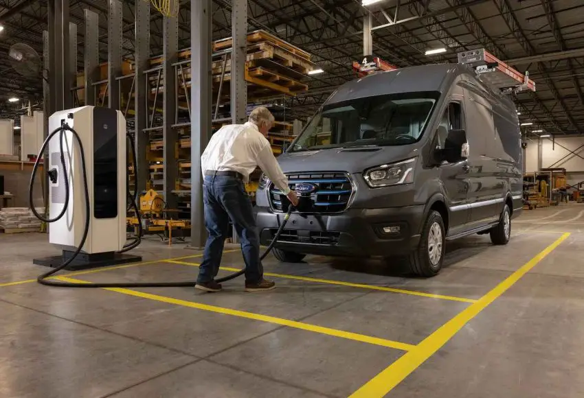 A photo showing the exterior of the Ford E-Transit from a front three quarters angle.