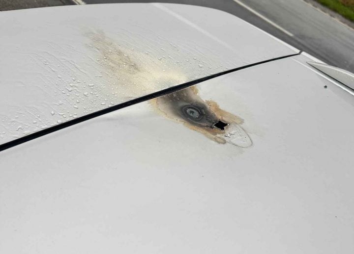 A photo showing the exterior of a Ford Edge that was struck by lightning.