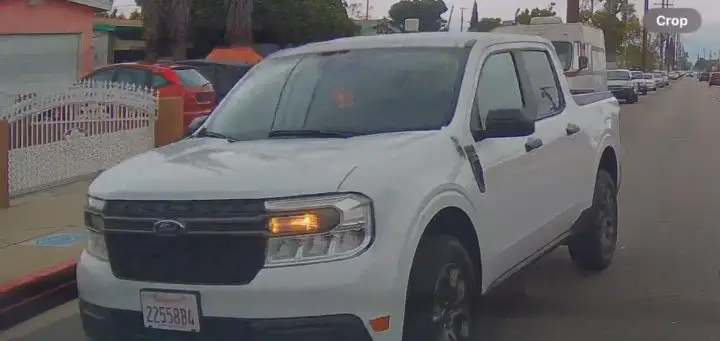 Video still of the Ford Maverick that illegally drove through an active crosswalk in California. The whole incident was caught on dashcam.