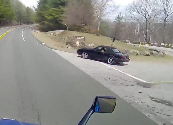 Video still of the Ford Mustang pulling itself over after speeding in front of a cop. 