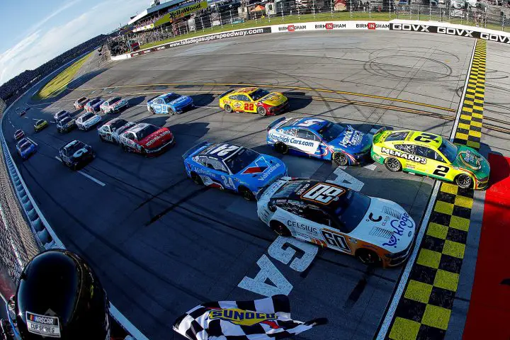 Photo showing Austin Cindric's No. 2 NASCAR Ford crossing the line ahead of the pack at Talladega on April 25, 2025.