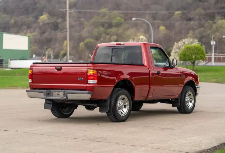 A photo showing the exterior of a 1999 Ford Ranger XLT from a rear three quarters angle