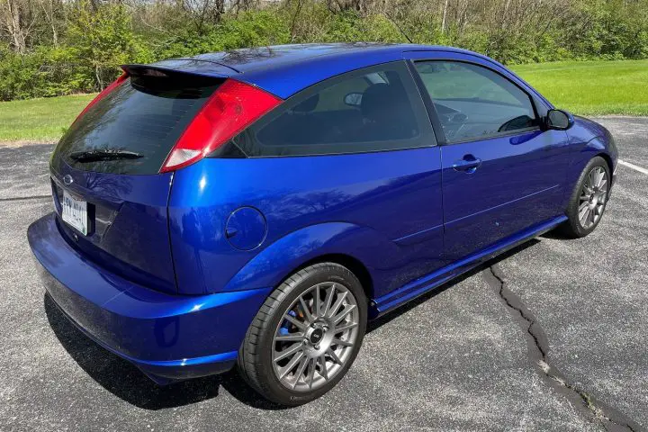 A photo showing the exterior of the 2003 Ford Focus SVT from a rear three quarters angle.