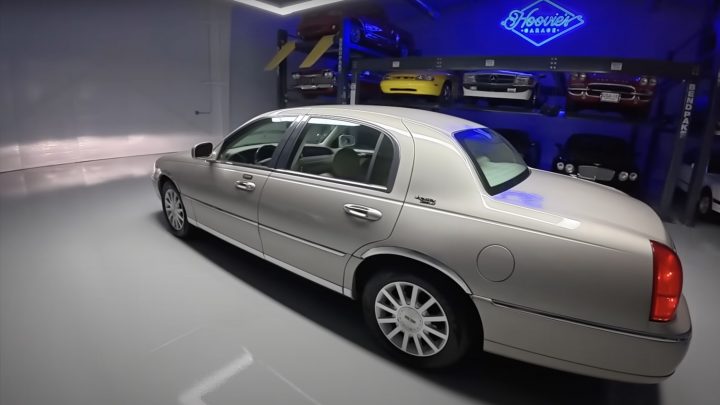 A photo showing the exterior of a 2010 Lincoln Town Car from a rear three quarters angle.