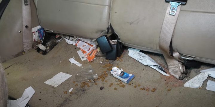 Video still showing the interior of the disgusting 2011 Ford Escape before it received a deep cleaning. 