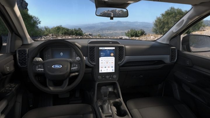 Photo of the interior of the 2025 Ford Ranger, showing the dashboard with its center stack touch screen. 