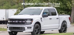 2026 Ford F-150 Lobo front three quarters view on public road.