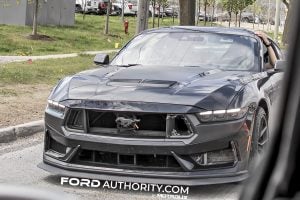 A photo showing the exterior of a 2026 Ford Mustang Dark Horse Boss prototype from a front three quarters angle.