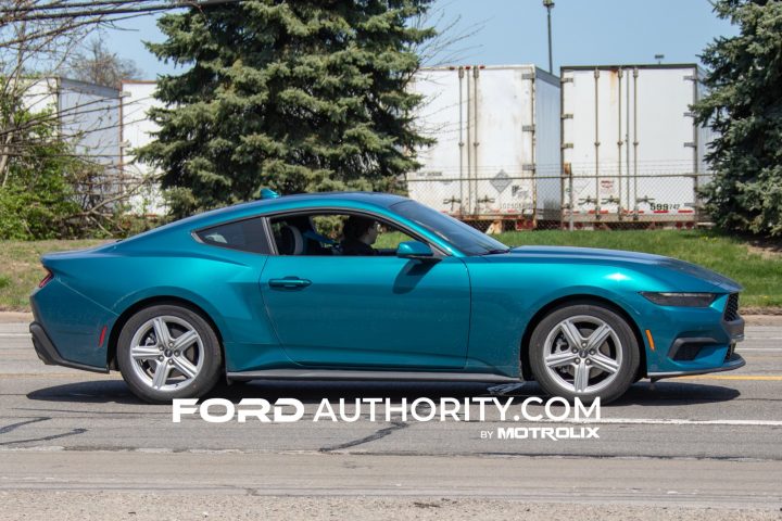 A photo showing a side view of the 2026 Ford Mustang wearing Adriatic Blue Metallic, a brand-new color for the 2026 model year.