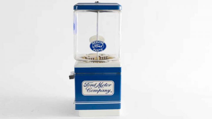 A photo showing a Ford gumball machine from a side angle.