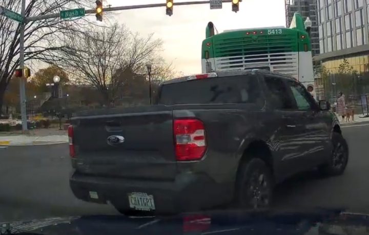 Video still of the Ford Maverick after cutting off the cam car. They then proceeded to run a red light on the wrong side of a double yellow.
