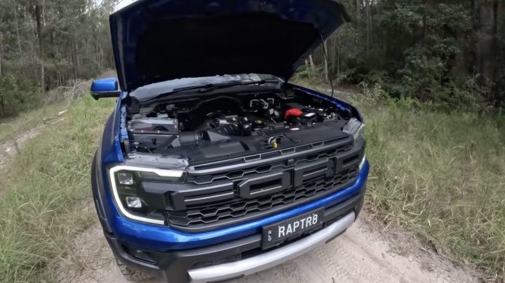 A photo showing the exterior of a Coyote V8-swapped Ford Ranger Raptor from a front three quarters angle.