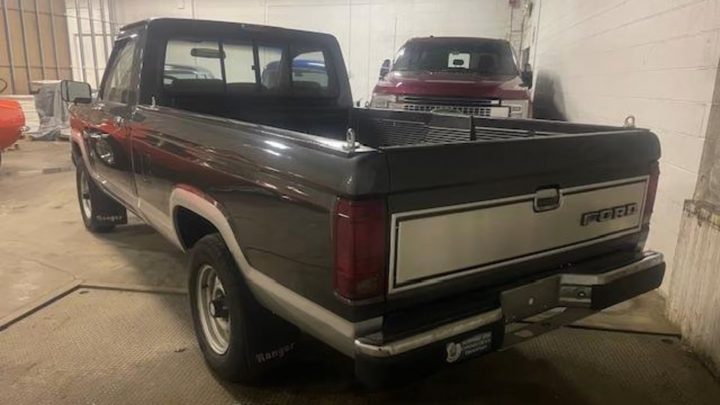 A photo showing the exterior of a 1987 Ford Ranger XLT from a rear three quarters angle.