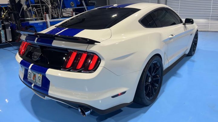 A photo showing the exterior of a 2015 Ford Mustang GT 50th Anniversary from a rear three quarters angle.