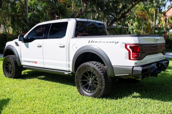 A photo showing a 2018 Ford F-150 Hennessey VelociRaptor V8 from a rear three quarters angle.