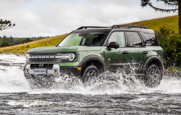 Front three-quarters view of 2025 Ford Bronco Sport Badlands traversing water. Ford Bronco Sport sales jumped 39 percent, placing ninth among 15 entries during Q2 2025.