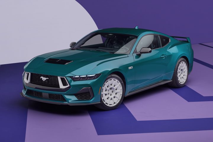 Elevated front three-quarters view of 2026 Ford Mustang featuring retro FX Package.