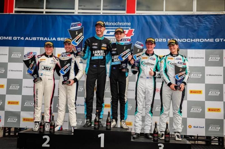 Photo of the Ford Mustang GT4 drivers George Miedecke and Rylan Grey atop the podium after the June 1st race at Queensland.