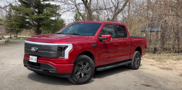 Video still of the Ford F-150 Lightning, shown parked at a front three-quarters angle. The pickup beat its key rival, the Chevy Silverado EV, in a recent comparison.