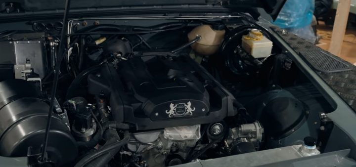 Video still of the Ford EcoBoost engine under the hood of the Land Rover Defender restomod. 