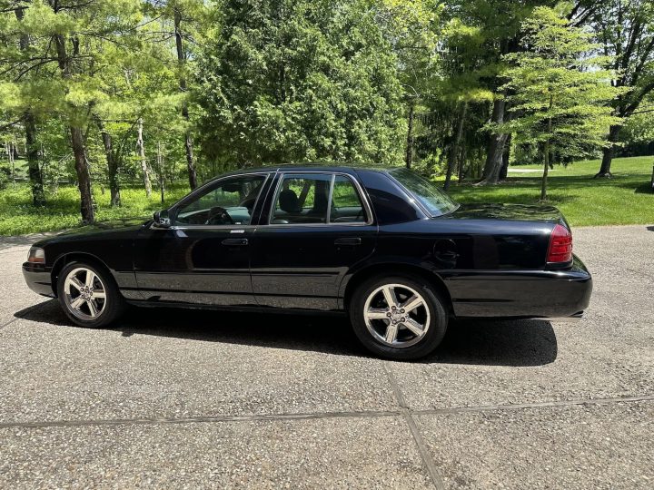 A photo showing the exterior of a 2003 Mercury Marauder from a rear three quarters angle.