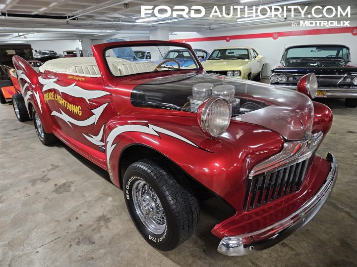Photo of the modified 1946 Ford "Grease Lightning" pictured from a front-three quarters angle. The model is on display in Los Angeles. 