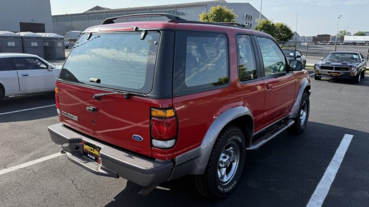 A photo showing the exterior of a 1997 Ford Explorer Sport from a rear three quarters angle.