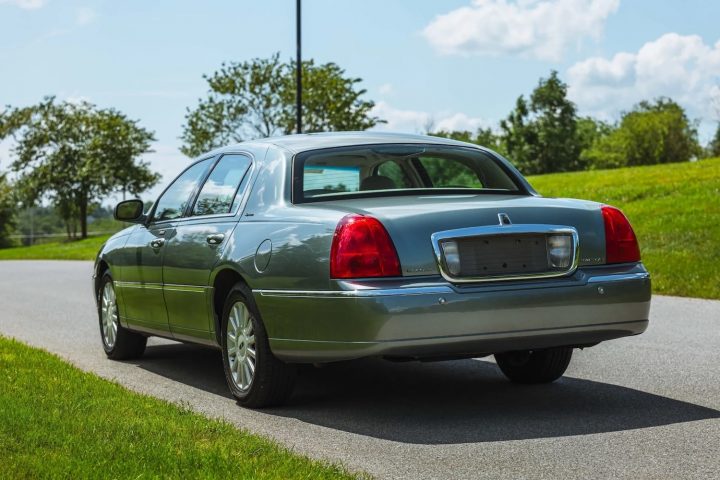 A photo showing the exterior of a 2005 Lincoln Town Car from a rear three quarters angle.