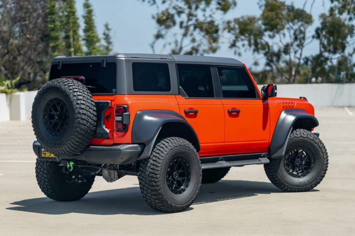 A photo showing the exterior of a 2023 Ford Bronco Raptor from a rear three quarters angle.
