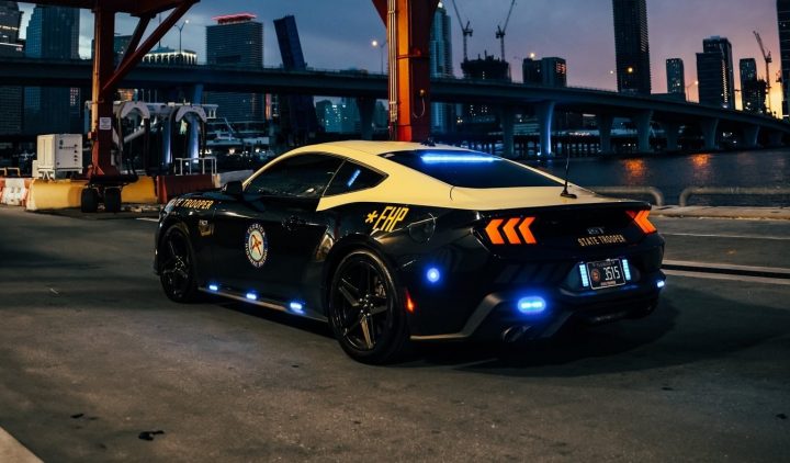 A photo showing the exterior of the Florida Highway Patrol S650 Ford Mustang from a rear three quarters angle.
