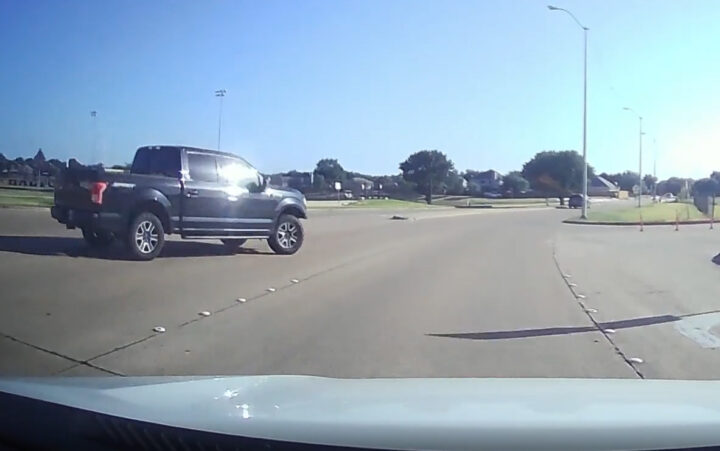 Video still of the Ford F-150 that decided the best place to turn right from was the left-hand turn lane. Thankfully, no accident ocurred.