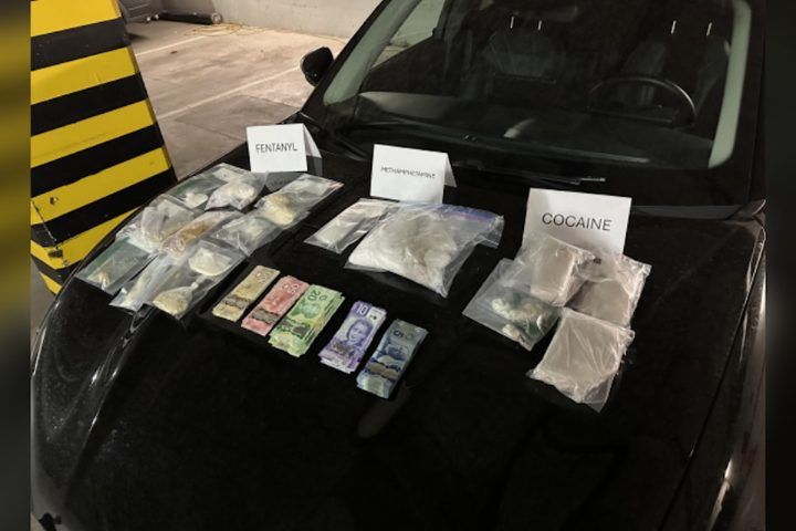 A photo showing the hood of a Ford Mustang Mach-E being used to transport drugs.