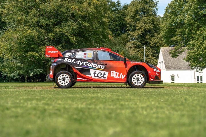 A side view of the Ford Puma Rally1 of Martins Sesks, which carries a special red and white livery for the forthcoming Rally Estonia. 