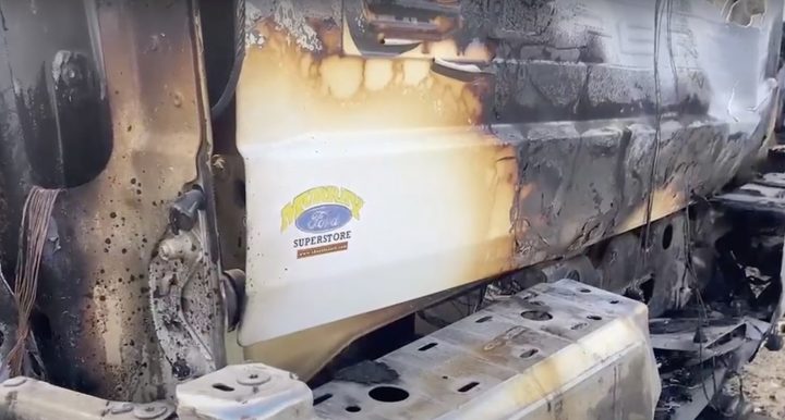 A photo showing the tailgate of a Ford Super Duty F-350 that caught on fire.