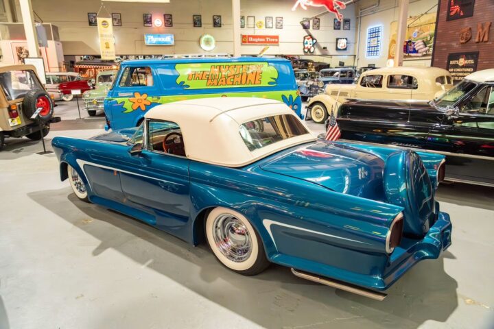 A photo showing the exterior of a 1956 Ford Thunderbird from a rear three quarters angle.