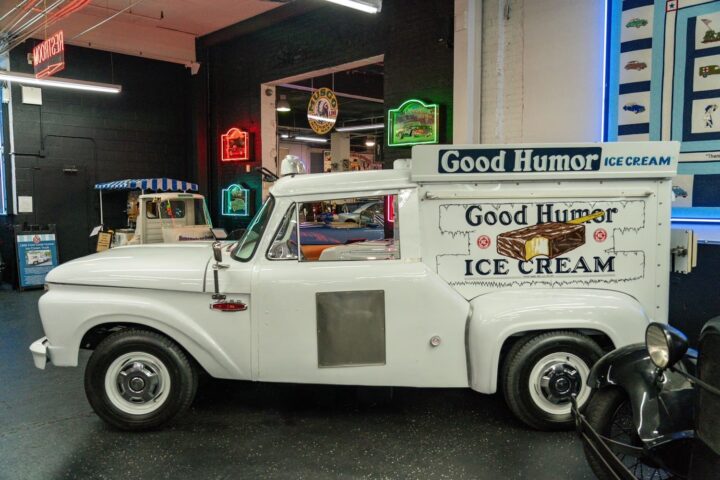 A photo showing the exterior of a 1966 Ford F-100 Good Humor ice cream truck from a side angle.