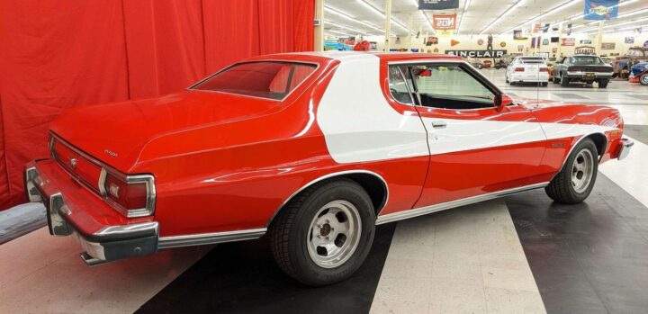 A photo showing the exterior of a 1974 Ford Gran Torino from the 'Starsky and Hutch' movie from a rear three quarters angle.