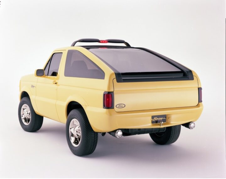 A photo showing a rear three-quarters view of the 1992 Ford Bronco Boss concept, showing its retractable roof in the "down" position.