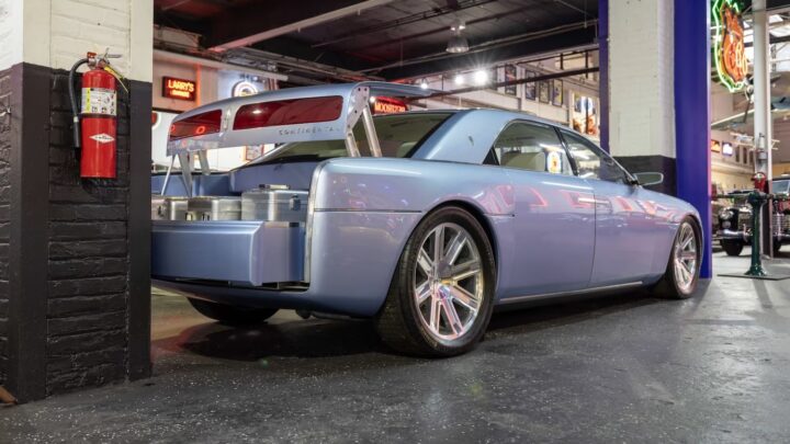 A photo showing the exterior of the 2002 Lincoln Continental concept from a rear three quarters angle.