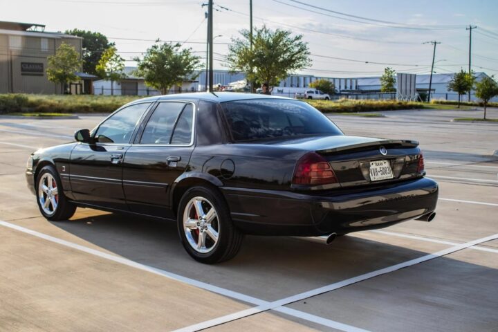 A photo showing the exterior of a 2003 Mercury Marauder from a rear three quarters angle.