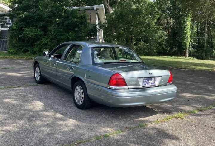 A photo showing the exterior of a 2006 Ford Crown Victoria from a rear three quarters angle.